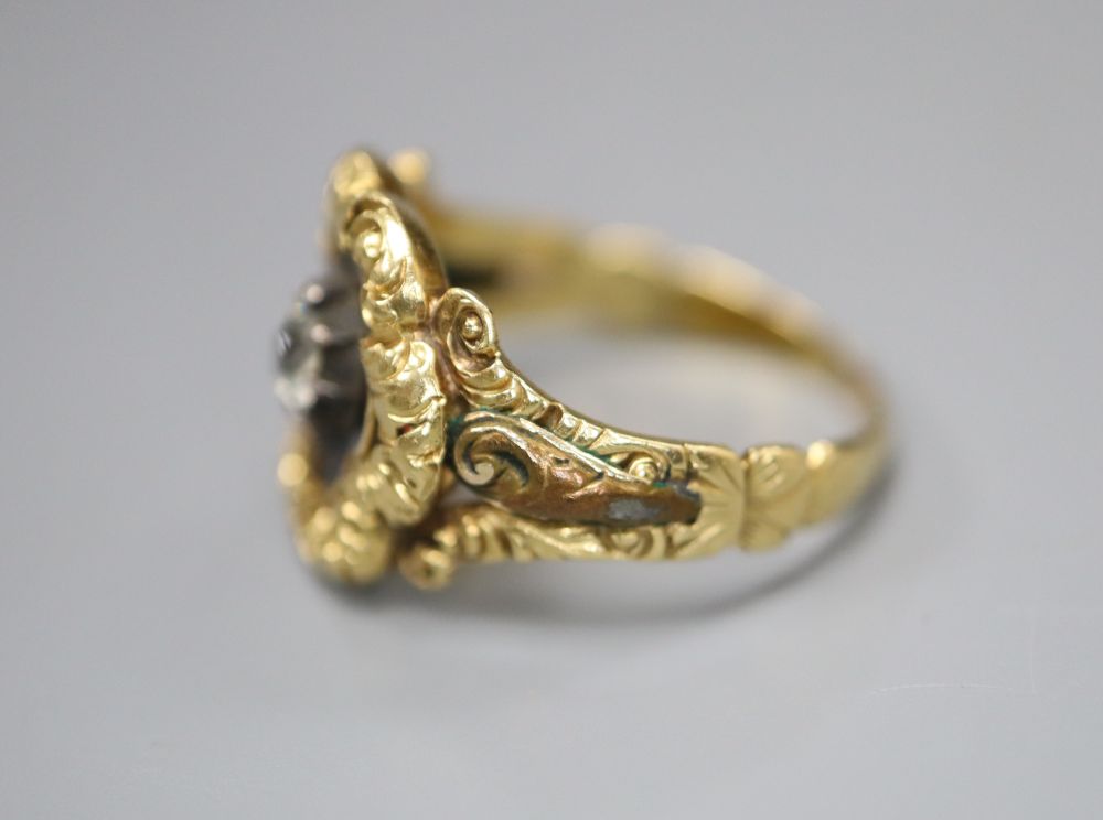 A William IV gold (tests as 14ct) and black enamel memorial ring set with a single diamond, size K/L, gross 3.6 grams,